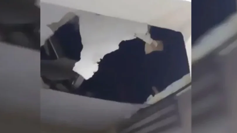 Buraco no teto da casa atingido pelo drone