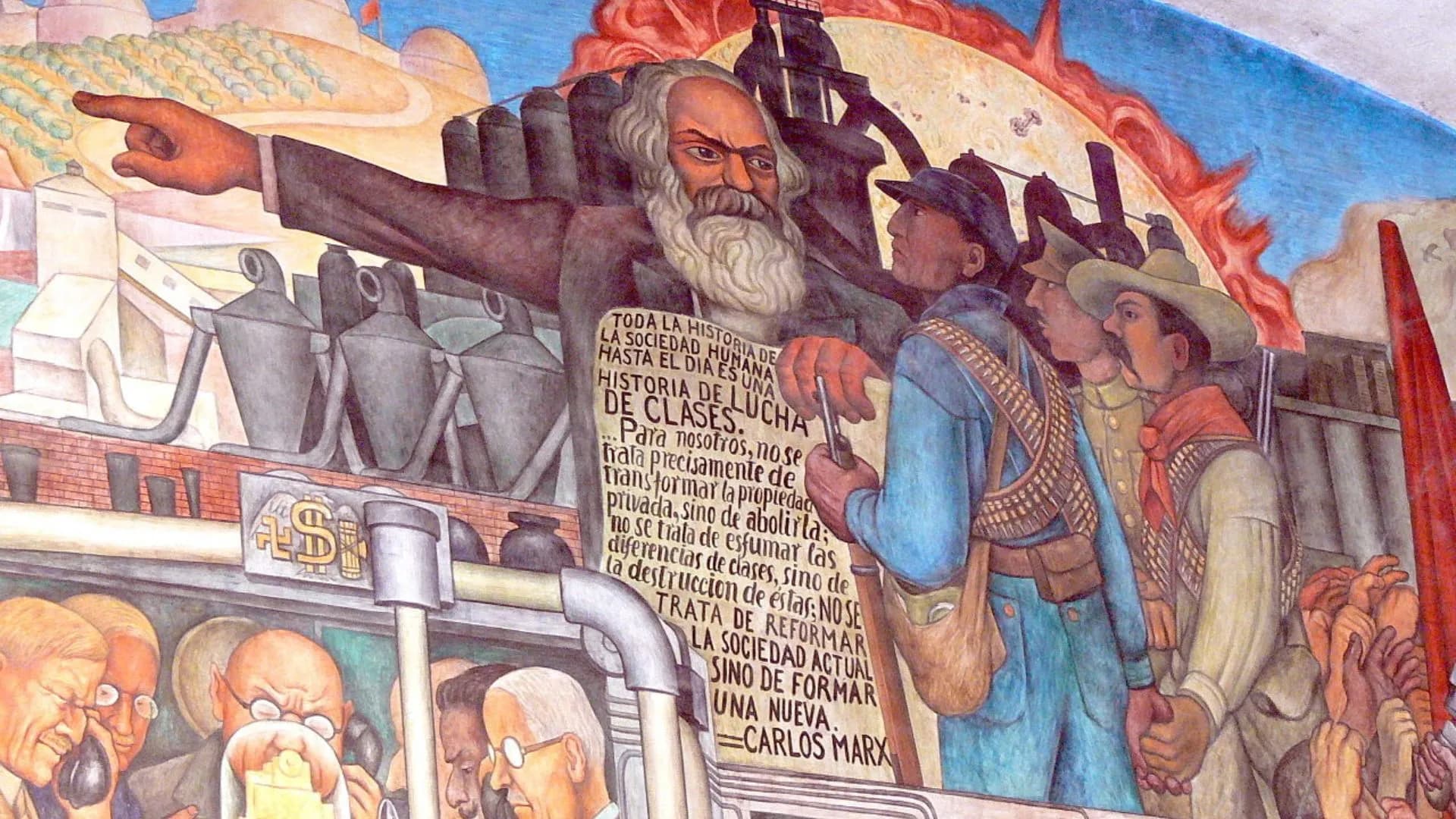 No desenho Karl Marx mostra o Manifesto Comunista para três homens vestidos com uniformes de proletários, camponeses e militares representando as classes sociais e aponta para a revolução.